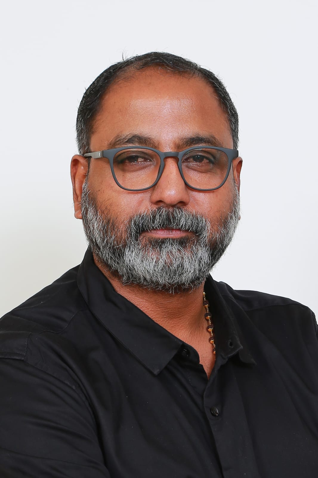 Dr. ARUN MAVELY